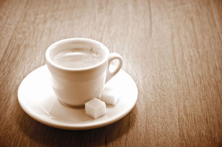 cup of coffee on wood tableの写真素材
