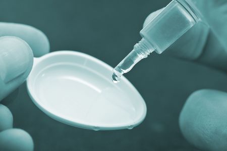 medicine drop and spoon closeupの写真素材