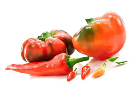 different peppers isolated on white の写真素材