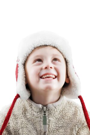 looking up boy isolated on whiteの写真素材