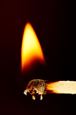 wood match with fire and smokeの写真素材