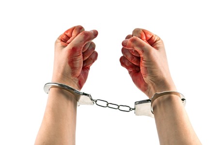 bloody murderer hands isolated on whiteの写真素材