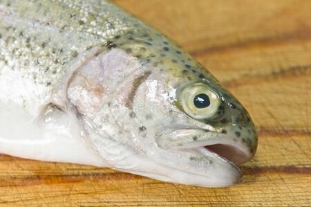 fresh trout on wood table