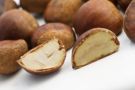 ripe brown chestnuts close upの写真素材