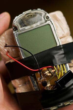 homemade bomb with mobile phone closeupの写真素材
