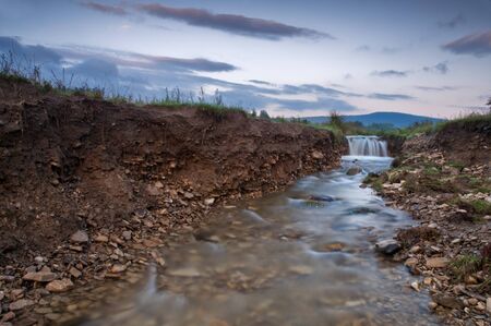 small waterfall on morning time