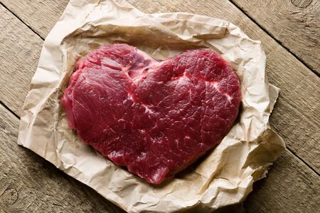 beef heart in paper closeupの写真素材