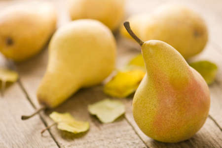 pears on wood table closeup