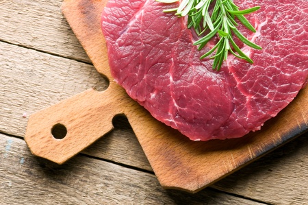 beef piece on wood board closeupの写真素材