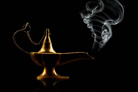 alladin lamp isolated on blackの写真素材