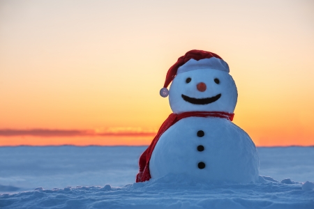 snowman on orange sunset の写真素材