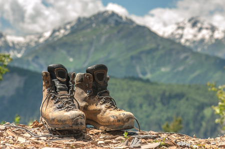 tourist boots and mountain on summer timeの写真素材
