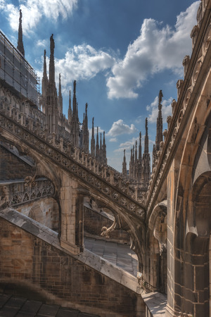 gothic church on piazza duomo Milanの写真素材