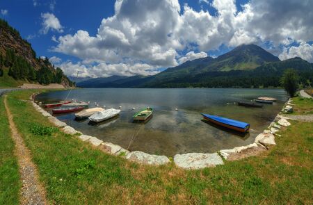 Amazing sunny day at Champferersee lake in the Swiss Alps. Silvaplana village, Switzerland, Europe.の写真素材