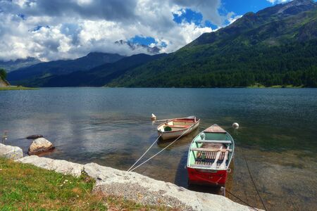 Amazing sunny day at Champferersee lake in the Swiss Alps. Silvaplana village, Switzerland, Europe.の写真素材