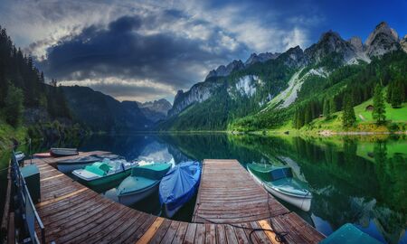 Fantastic morning on mountain lake Gosausee, located in the Austia. Dramatic unusual scene. Alps,...