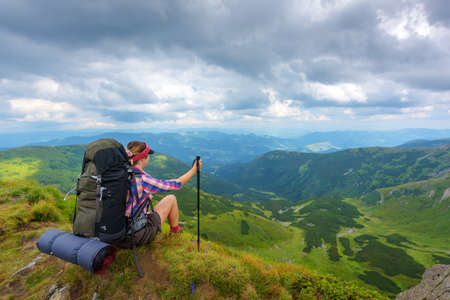 alone tourist in high mountainの写真素材