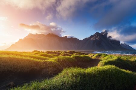 Famous grass hills near Stokksnes mountains, Icelandの写真素材