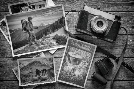 photography concept with old camera and photosの写真素材
