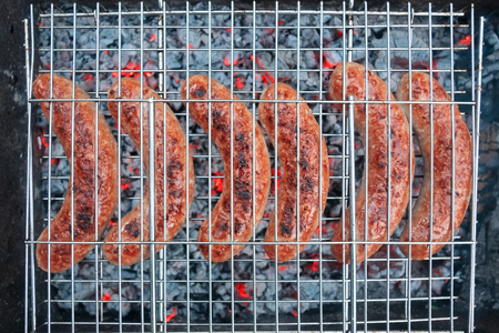 Sausage on grill close up.の写真素材