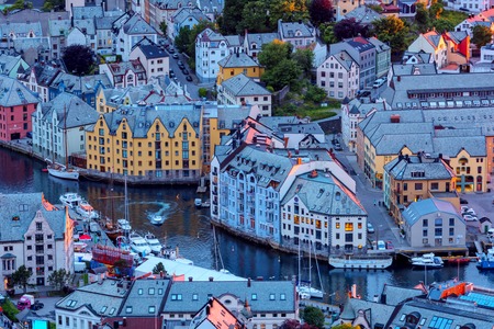 Colorful sunset in Alesund port townの写真素材