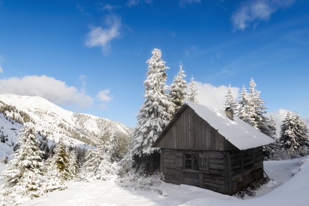 Fantastic landscape with snowy houseの写真素材