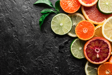Mix of different citrus fruits closeup. Healthy diet vitamin concept. Food photographyの写真素材