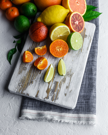 Mix of different citrus fruits closeup. Healthy diet vitamin concept. Food photographyの写真素材
