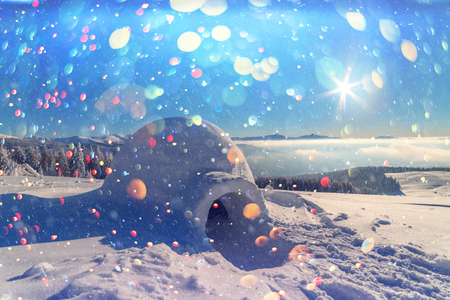 Real snow igloo house in the winter Carpathian mountains.