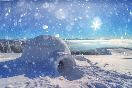 Real snow igloo house in the winter Carpathian mountains.