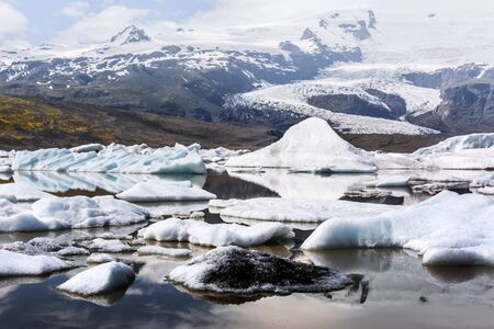 Icebergs in Fjallsarlon glacial lagoon. Vatnajokull National Park, southeast Iceland, Europe....