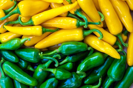 Yellow and green hot peppers closeup. Food photographyの写真素材