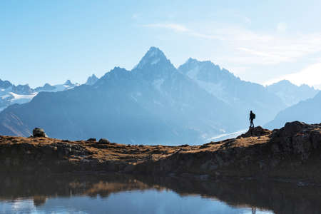 Amazing view on Monte Bianco mountains range with tourist on a background. Lac de Cheserys lake,...
