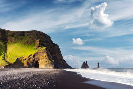 Incredible view on Black beach and Troll toes cliffs in cloudy weather. Reynisdrangar, Vik, Iceland. Landswcape photographytの写真素材