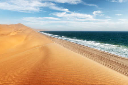 Namib desert and Atlantic ocean wavesの写真素材