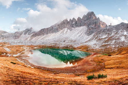 Clear turquoise water of alpine lake Piani in the Tre Cime Di Laveredoの写真素材