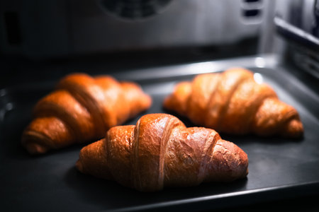 Croissants are baked in the home ovenの写真素材