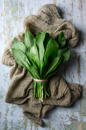 Bunch of fresh bears wild garlic on kitchen rug