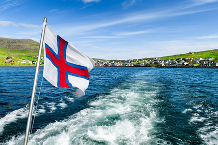 Sailing on the motorboat from the city of Sorvagur to the island of Mykinesの写真素材