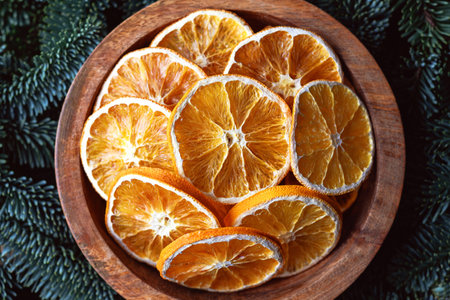 Top view of dried orange slices in wooden boxの写真素材