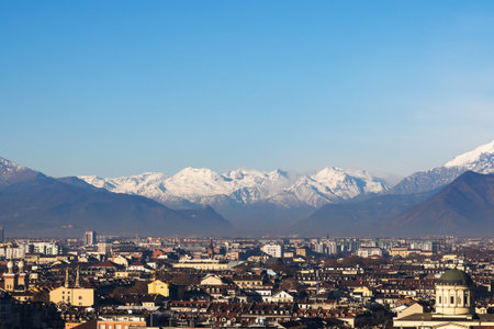 Panoramic view of the city of Turin with snowy Alpsの写真素材