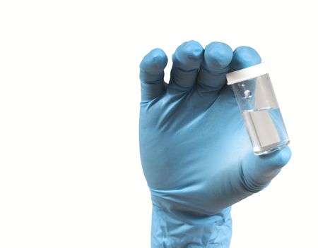 isolated hand with testing specimen,room for copy