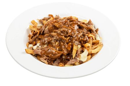 isolated poutine with cheese, gravy and braised beefの写真素材