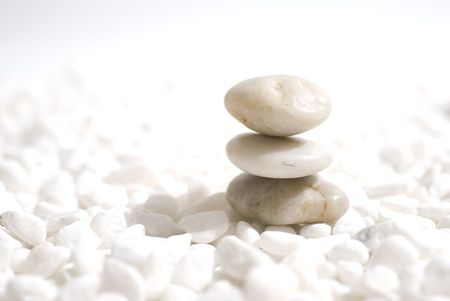 zen stones on white pebbles background - meditation conceptの写真素材