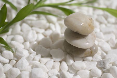 zen stones and bamboo on white pebbles background - meditation conceptの写真素材