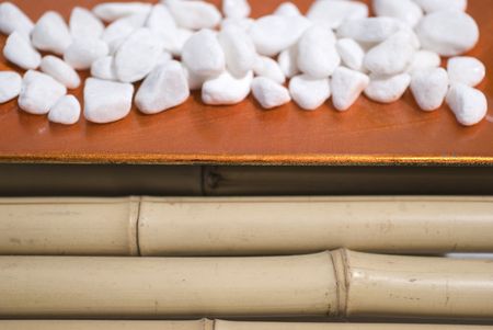 zen stones on bamboo background meditation conceptの写真素材