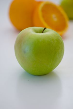 Fresh green apple fruit breakfast closeup on white backgroundの写真素材