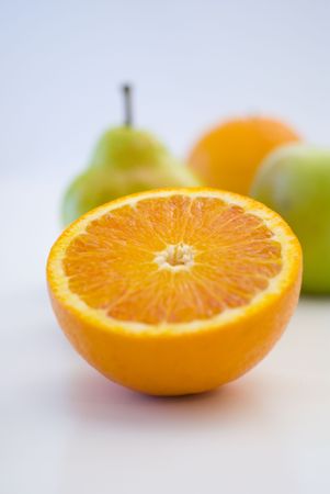 Fresh fruit, a tropical orange macro closeup, isolated on whiteの写真素材