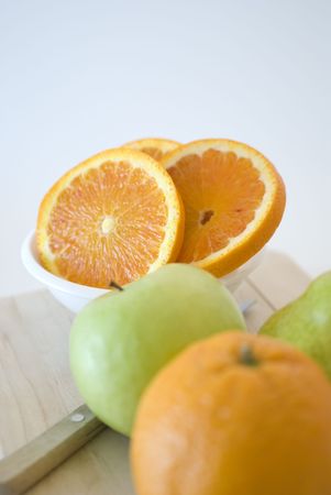 orange, apple and pear fresh fruit isolated on whiteの写真素材
