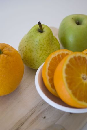 orange, apple and pear fresh fruit isolated on whiteの写真素材